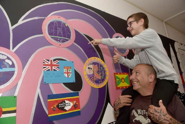Seekers Create have collaborated with Portsmouth Guildhall Trust and young people from The Harbour School to deliver exciting map making, doodle, Braille art workshops.
Pictured is: Kayne Saunders (11) with his dad Alan Saunders.