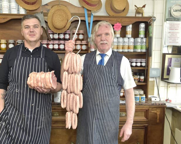 (l-r) Jacob and his dad David Smith have taken over Twells Butchers in Portchester, which will now be known as Portchester Butchers.

Picture: Sarah Standing (310123-8962)
