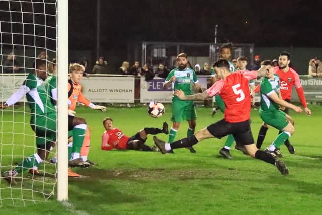 Fareham (red) on the attack against Petersfield. Picture by Ken Walker.
