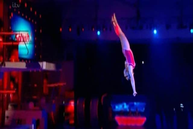 One of MP Penny Mordaunt takes a dive on ITV's Splash! in January 2014