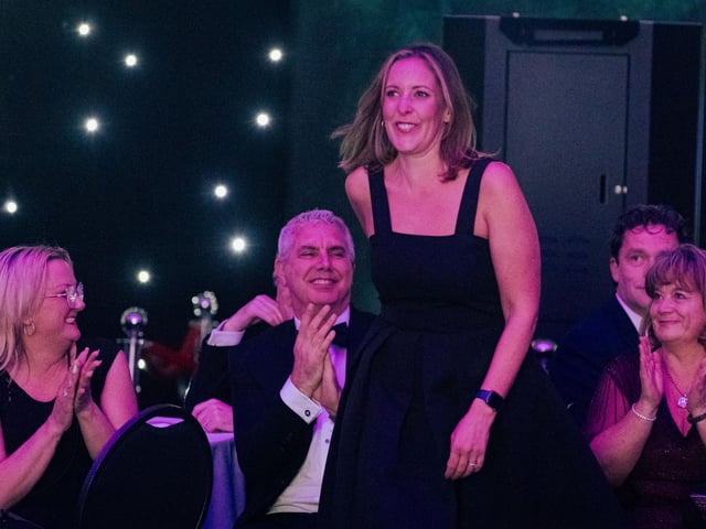 Sarah Roads, owner of SLR Recruitment Solutions, comes to collect her award for Small Business of the Year. Picture: Keith Woodland (270321-39)
