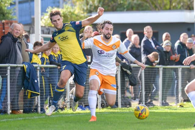Joe Briggs battles for possession against Cray Wanderers. Picture: Martyn White.