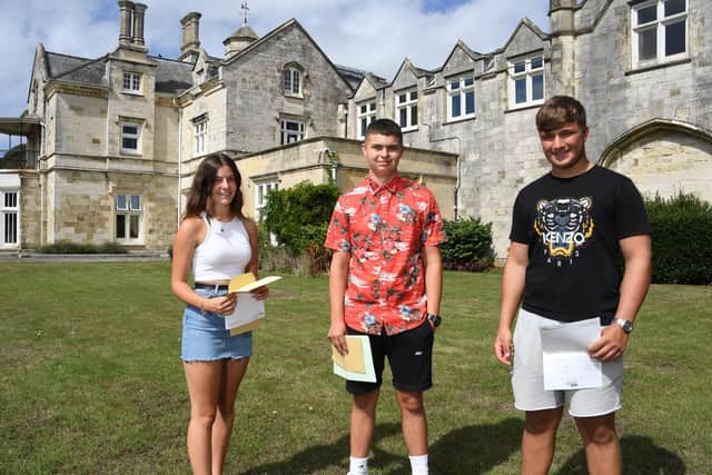 GCSE results day at Bay House School and Sixth Form in Gosport - 20/8/20. Pictured L-R Cassie Clark 16, Finn Strong 16, Will Roser 16. Photo: Paul Jacobs