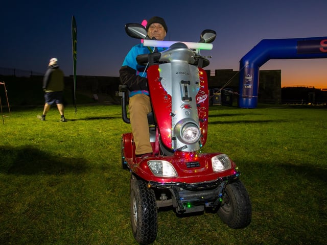 Michael Maddock came to Castle Field, Southsea to take part in the Alzheimers Society Glow Walk on Friday evening. Photos by Alex Shute