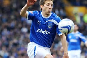 Wes Fogden had quit the Championship with Bournemouth to aid Pompey's battle against relegation from the Football League in January 2014. Picture: Joe Pepler