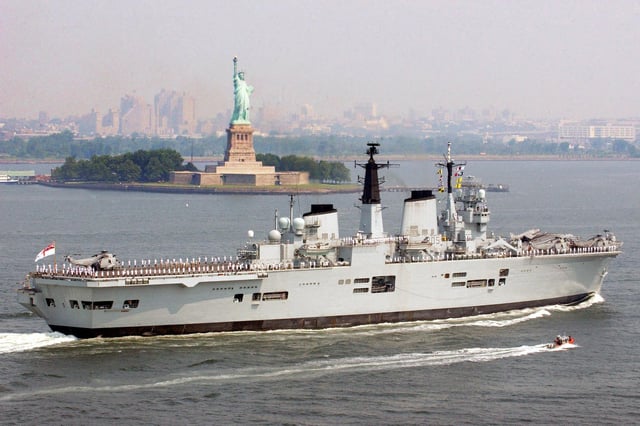 The Royal Navy's HMS Invincible passes the Statue of Liberty Thursday July 1, 2004, at the start of a six day visit to New York. Picture:LA (Phot) Dave Gallagher / HMS Invincible / Crown Copyright.