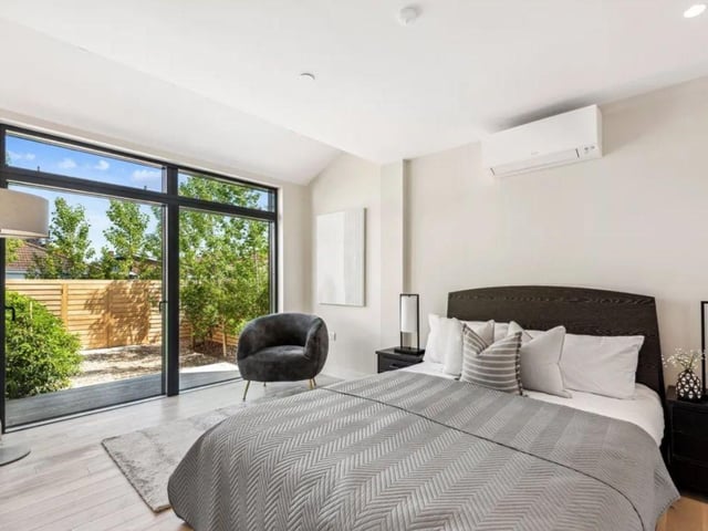 The listing says: "The accommodation, on three floors, is thoughtfully arranged to include two open-plan living and sitting areas, as well as a cosy snug to afford privacy. Three guest bedrooms and bathrooms are placed on the ground floor and have immediate access to the south facing deck and attractively landscaped gardens."