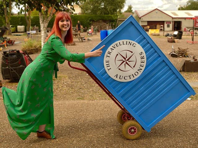 Izzy Balmer with the roll-in rostrum featured in The Travelling Auctioneers