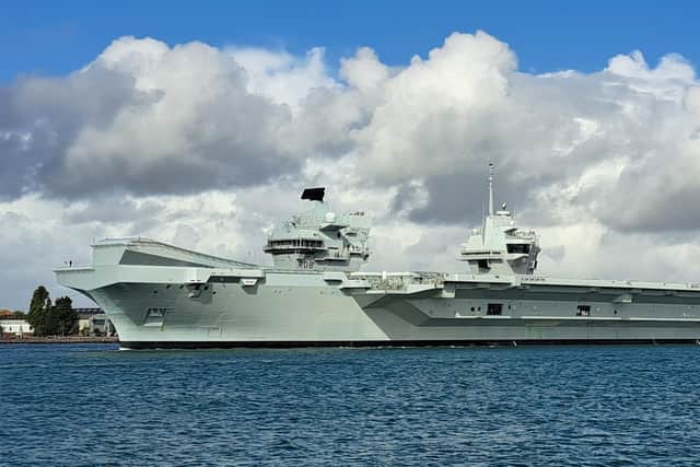 HMS Queen Elizabeth leaves Portsmouth for the Westlant22 exercises off America, taking the place of her sister ship HMS Prince of Wales, which has propeller shaft issues 
Picture: Karen Davis-Duncan