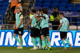 Joe Pigott celebrates opening the scoring against Cardiff in Pompey's 3-0 Carabao Cup triumph. Picture: Dan Minto/ProSportsImages