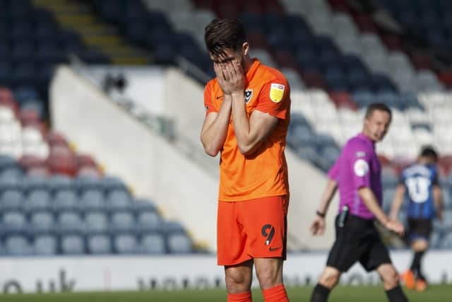 John Marquis holds his head in his hands after he misses an opportunity to score against Rochdale. Picture: Daniel Chesterton/phcimages.com