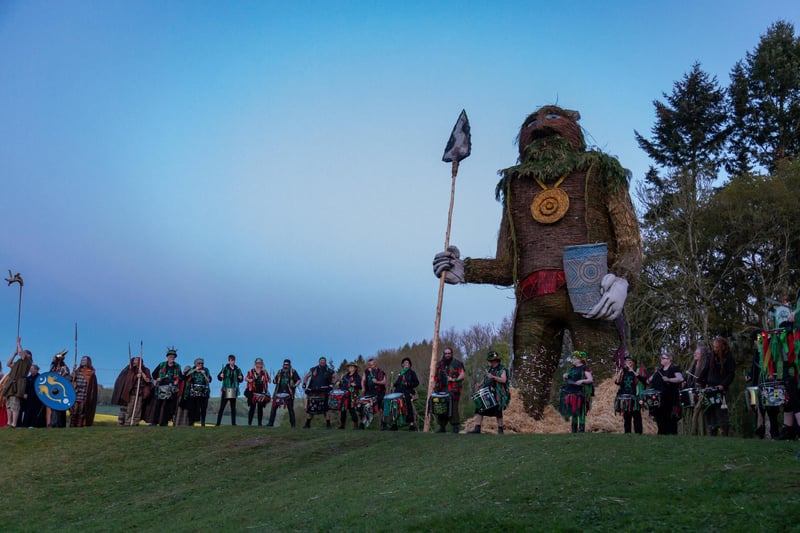 The 40ft wickerman awaits his fait as the sunset procession heads his way.