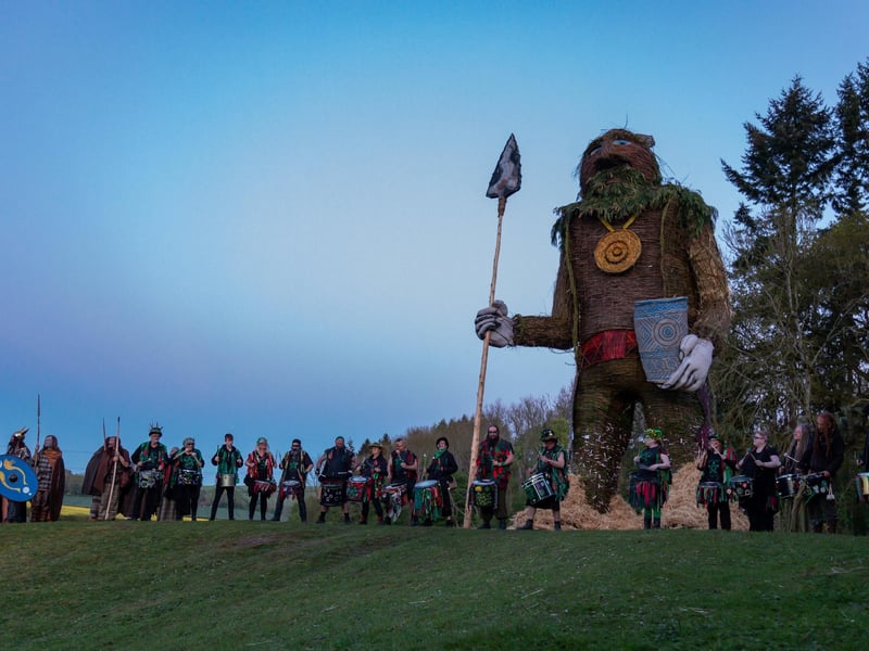 The 40ft wickerman awaits his fait as the sunset procession heads his way.