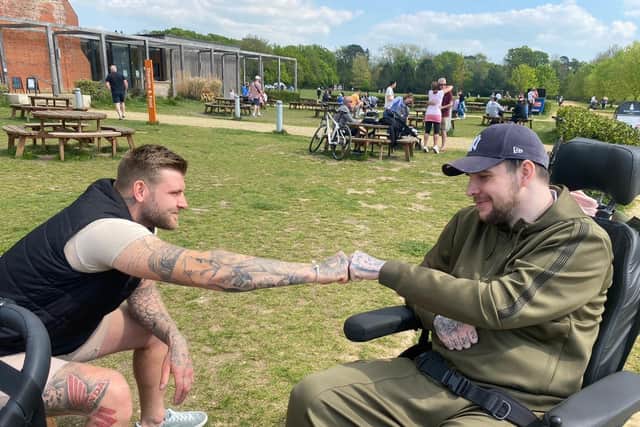 The Evans family were given a van by the Farrugia, so Josh can spend more time at different places with his family. Here, he is in Victoria Park, Portsmouth, on Sunday, April 24, spending time with his brother, Joseph Evans, 23. Picture: Maxine Evans.