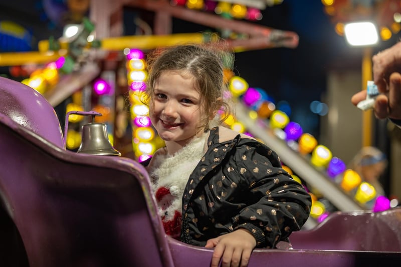 Esmee Bayliss (5) takes a turn on the flying jumbos during the festivities in Fareham. Picture: Mike Cooter (181123)