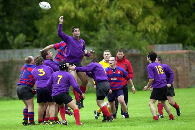 Southsea Nomads (purple shirts) v United Services Portsmouth at the University of Portsmouth playing fields, 2004.
Picture: Michael Scaddan.