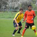 Jake Thomson, right, in action for AFC Portchester against Moneyfields in 2014. Picture: Allan Hutchings