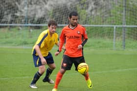 Jake Thomson, right, in action for AFC Portchester against Moneyfields in 2014. Picture: Allan Hutchings