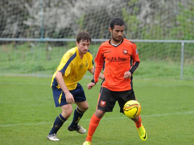 Jake Thomson, right, in action for AFC Portchester against Moneyfields in 2014. Picture: Allan Hutchings