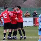 Tom Settle, middle, has just made it 2-2 from the penalty spot. Picture by Ken Walker.