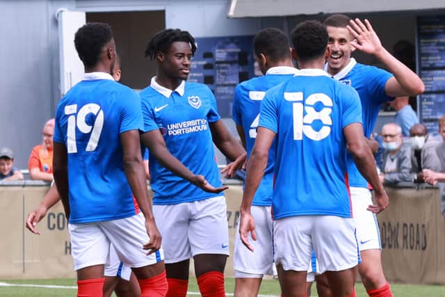 Gassan Ahadme celebrates his hat-trick for Pompey in their friendly win at the Hawks. Picture: Paul Collins