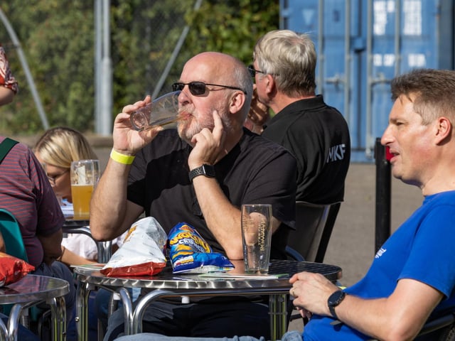 Making the most of the sun at the Wickham Charity Beer Festival.
Picture: Mike Cooter