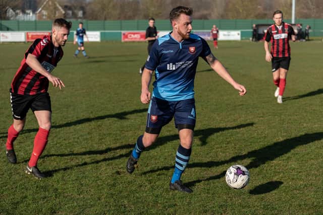 AFC Portchester's Adam Cripps, right, at Cams Alders in 2018/19. Picture: Vernon Nash