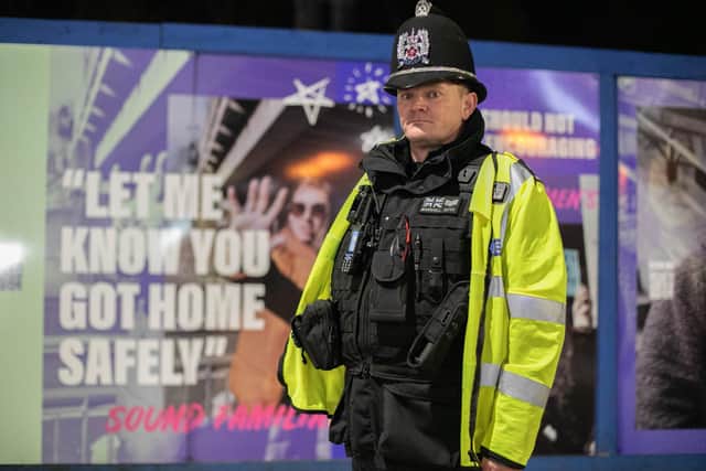 Sgt Paul Marshall in front of the safety campaign posters in Stanhope Road, Portsmouth. Picture: Habibur Rahman