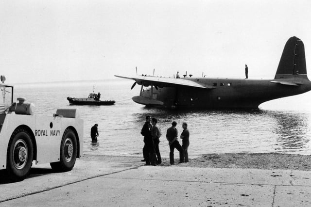 A Royal Navy tugmaster waiting for the flying boat Southern Cross to be positioned at the bottom of the RN Hovercraft slipway at HMS Daedalus in July 1981 PP765 
