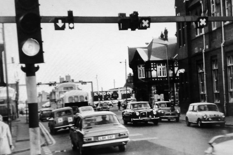 Tidal flow lights along Commercial Road 
In 1970 two-way tidal flow traffic light was introduced to great success. The Air Balloon pub on the right. Photo: The News archive.