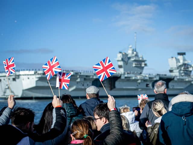 Pictured: Families gathering at Portsmouth Naval Base to see HMS Prince of Wales return home after a three month deployment in the USA. The Queen Elizabeth-class carrier completed her first long-term mission after being beset with mechanical problems last year.
