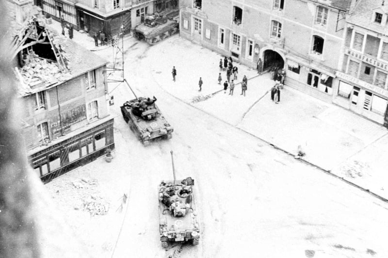 Sherman tanks in La Deliverande 8/6/44 en-route to Caen