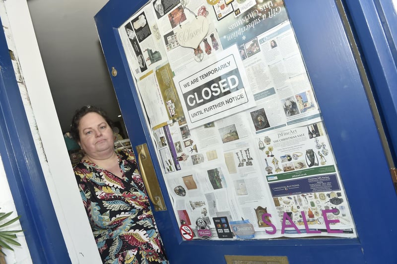 Damage to Voluptuous Vintage shop and a residential property next door in Village Road, Alverstoke, where a two-car collision took place and three people have been arrested.

Pictured is: Owner of Voluptuous Vintage in Village Road, Alverstoke, Jennifer Darling (47).

Picture: Sarah Standing (110124-4651)