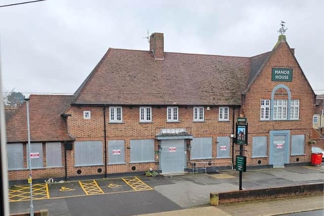 The Manor House boarded up. Pic: Pete Turner