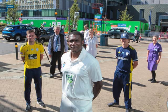 Hampshire players (from left) Mason Crane, Keith Barker and Sam Northeast with University Hospital staff in Southampton. Picture: Hampshire Cricket