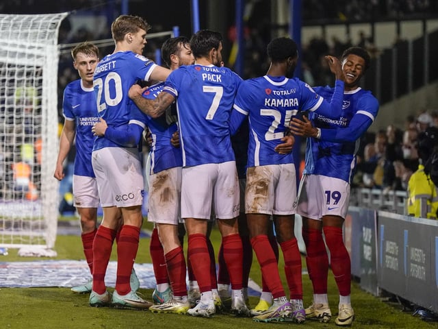 The Pompey player celebrate Myles Peart-Harris' goal in front of the Milton End fans