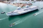 HMS Prince of Wales leaving Portsmouth Harbour on Wednesday afternoon.

Pictured - HMS Prince of Wales

Photos by Alex Shute