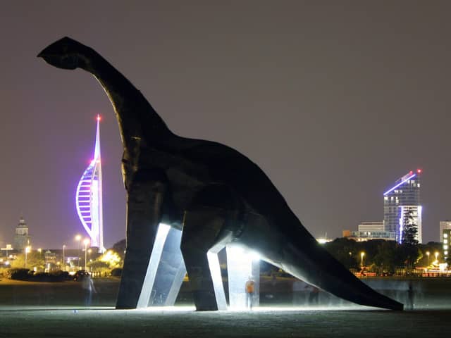A night shot of Ultrasaurus on Southsea Common with the Portsmouth skyline beyond. Picture: Jon Eastham