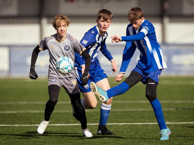 Action from the U15 Campbell McFaull Invitation Cup final between Hayling St Andrews Blue and Hayling St Andrew White. Picture: Keith Woodland (260221-69)