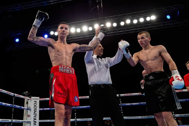 Mark Chamberlain (red trunks) celebrates beating Aleksandrs Birkenbergs in 38 seconds in December 2018. Photo by Paul Harding/Getty Images.