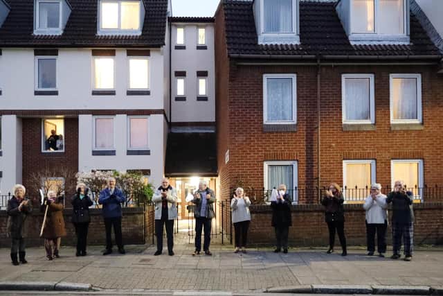 Homesea House  residents on Green Road, Southsea, clap for the NHS.

Picture: Chris Moorhouse
