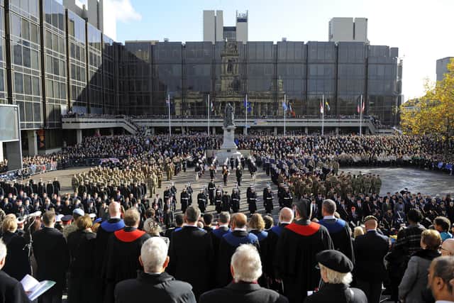 A packed Guildhall Square, Portsmouth, for Remembrance Sunday in 2018. Picture: Malcolm Wells (181111-7429)