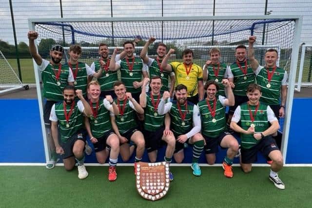 Havant Hockey Club's men's first-team celebrate after their 3-2 final win over rivals Fareham to be crowned Hampshire Cup winners