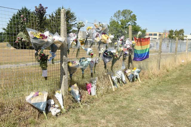 Tributes left in Fareham Park Recreation Ground just off Hilson Drive in Fareham, where a man died after allegedly being attacked by a dog.

Picture: Sarah Standing (120822-1700)