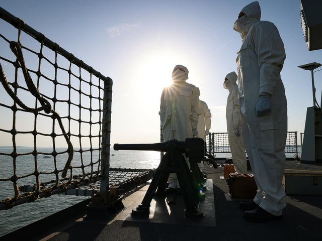 Pictured ship's company ceremonial firing party.