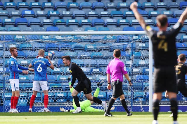 Wigan's Lee Evans celebrates after opening the scoring in Saturday's 2-1 victory over Pompey. Picture: Joe Pepler