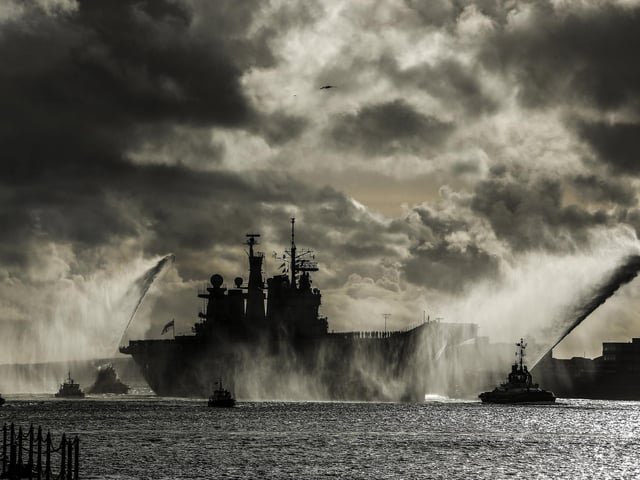 HMS Illustrious returns to Portsmouth Harbour on January 10, 2014 in Portsmouth. Photo by Dan Kitwood/Getty Images