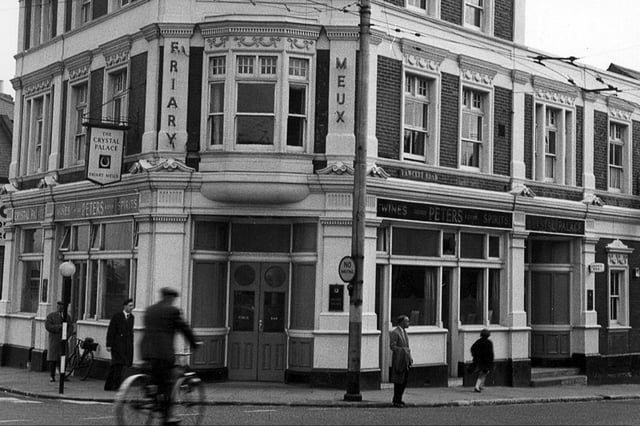 The Crystal Palace pub on the corner of Fawcett Road at Fratton Bridge. This was many Pompey fans' favourite drinking establishment and was once run by former Pompey player Jock Anderson who scored a goal in the 1939 FA Cup final. The cyclist has just passed over Fratton Bridge and is heading south down Fawcett Road. The pub was another superb building demolished for road improvements.