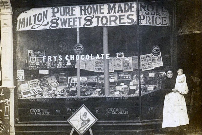 Gilbert's sweet shop, Eastney Road, Milton about 1912. Ethel Gilbert holding baby George Gilbert.