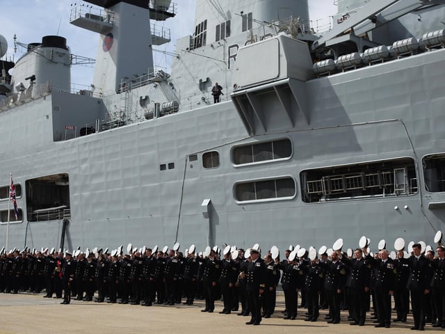 Company of the HMS Illustrious stand in formation during her decommissioning ceremony on August 28, 2014 in Portsmouth. Photo by Dan Kitwood/Getty Images